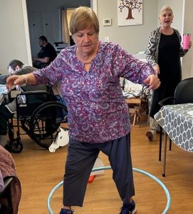 woman playing with hoola-hoop