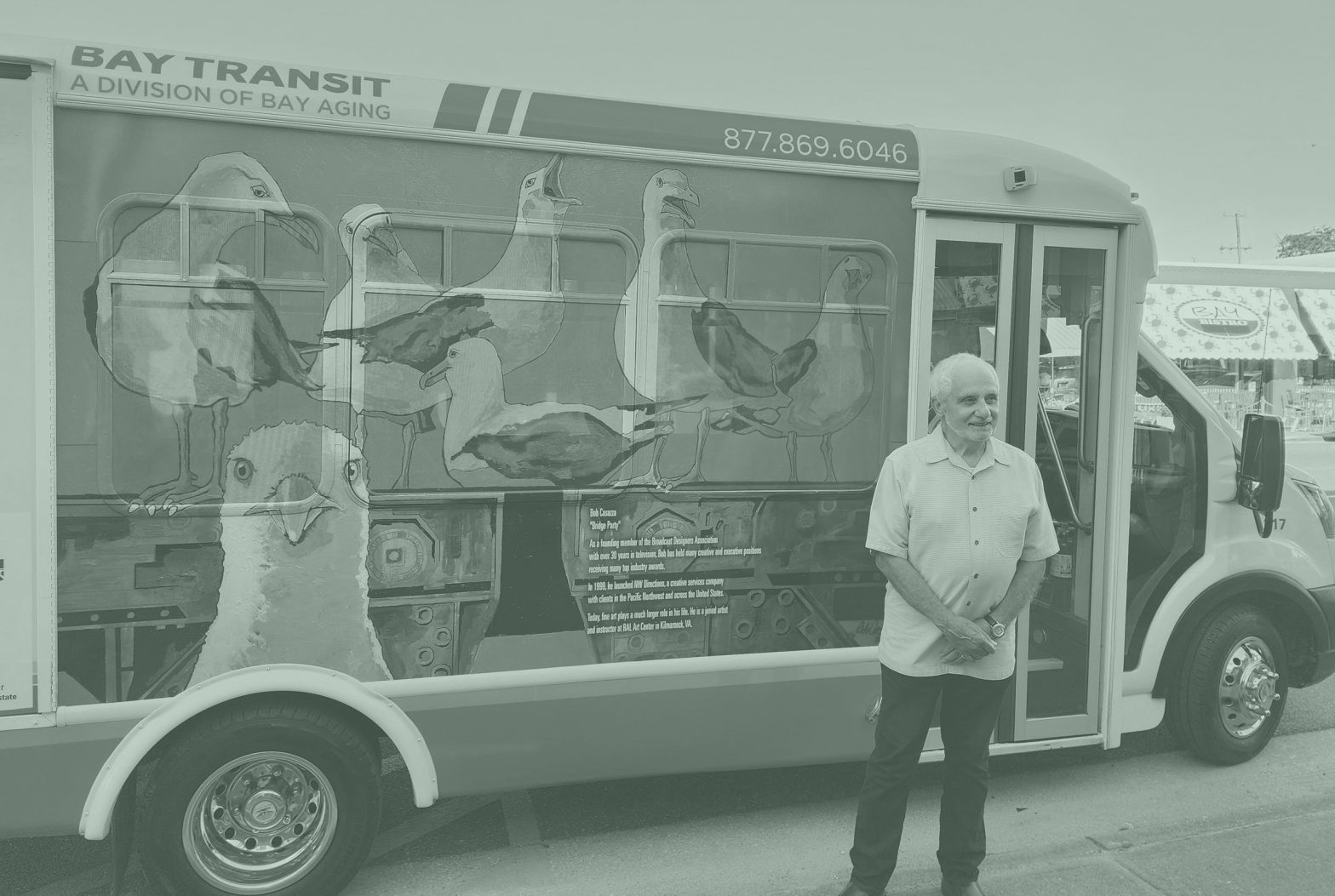 Man standing in front of bus